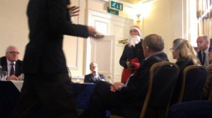 protesters dressed Santa Claus present GCM board with coal