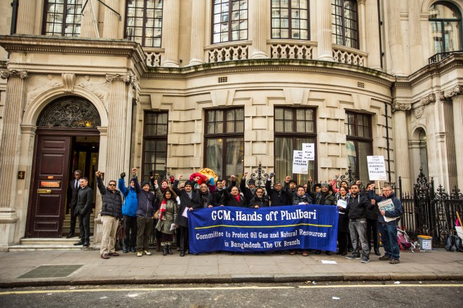     Bangladeshi community and climate change activists protest against the outcome of OECD complaint about Phulbari coal mine. Blockade and action outside GCM's AGM in December 2014. Photo: Golam Rabbani