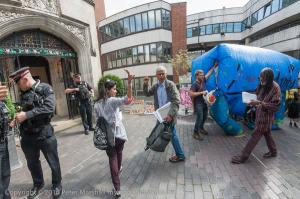 We entered the AGM  to represent communities inside the AGM during loud protest outside. Photocredit: Peter Marshall