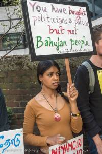 Foil Vedanta demo on 5 August 2016.  A Protester from affected community holds a placard. Photocredit: Peter Marshall