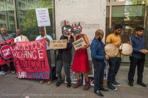 Shameless Gary Lye and Michael Tang dance with coal over deadbodies Photocredit Peter Marshall